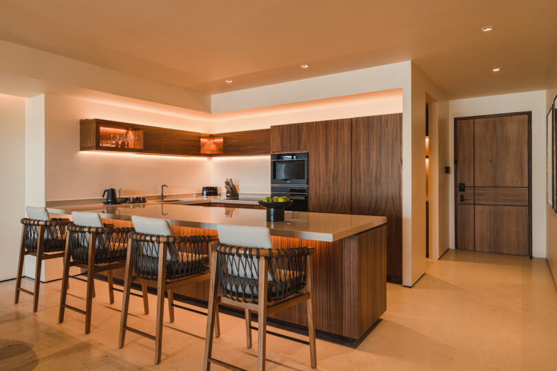 Kitchen and barstools within the Nobu Residences Los Cabos