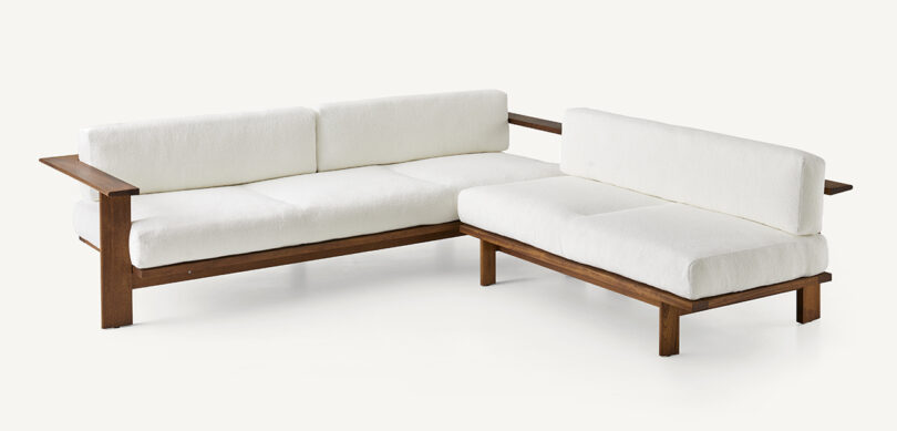 wood framed outdoor sectional sofa with white upholstery
