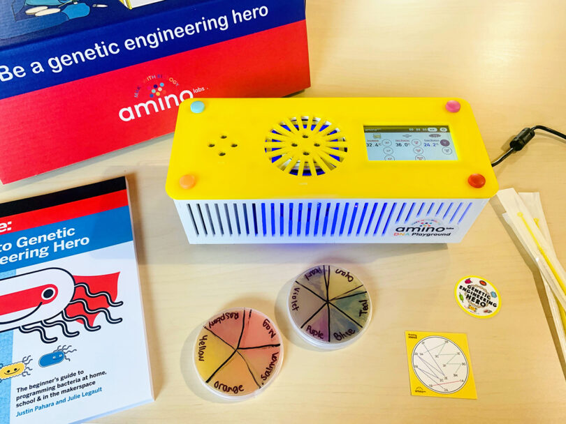 science project kit in red, blue, yellow, and white