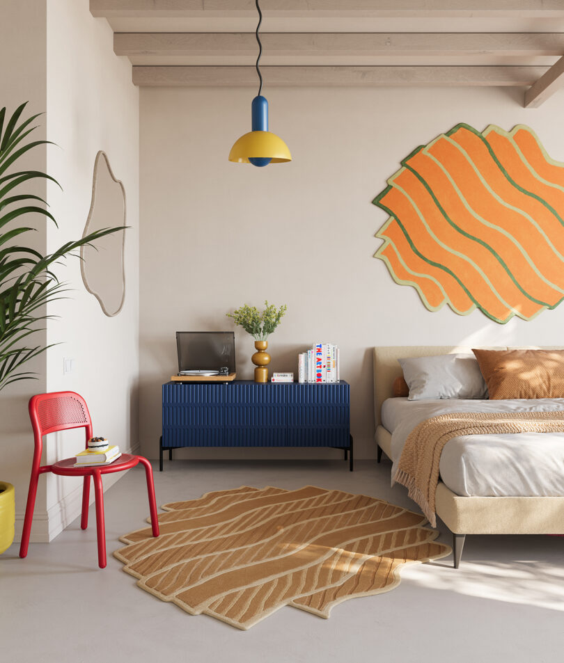 styled bedroom with modern orange rug