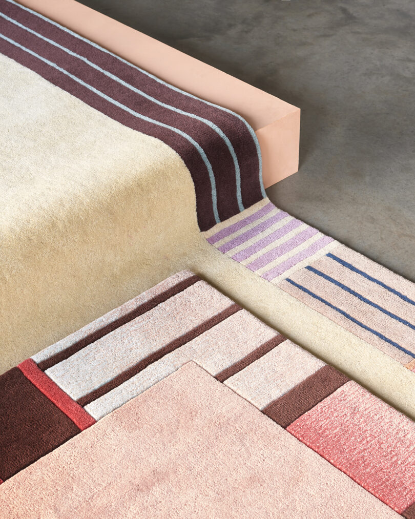 graphic rugs overlaying one another