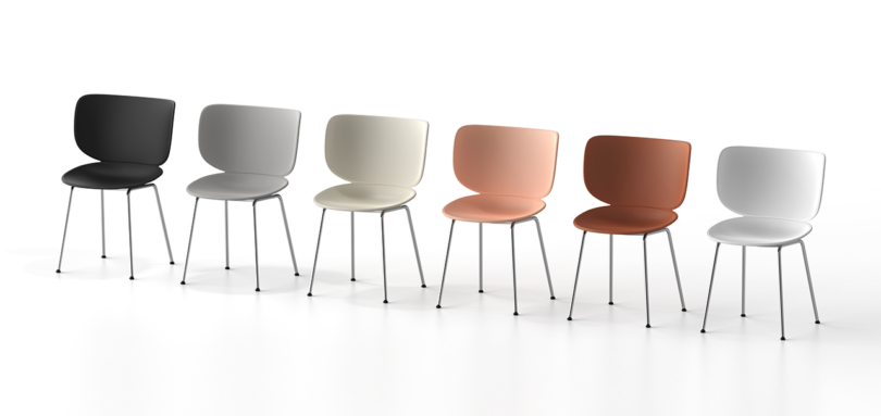 a row of six colors of the same chair design on a white background