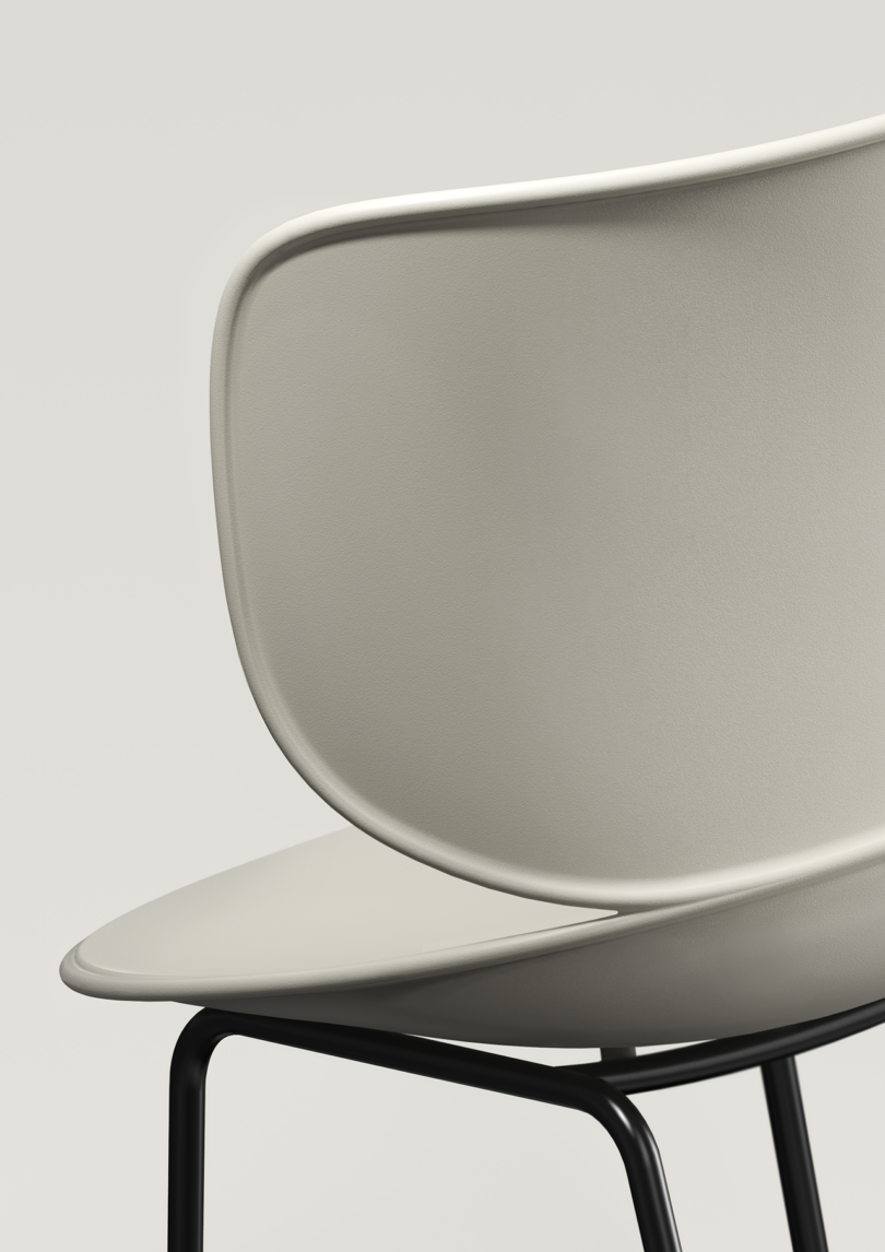 detail of a modern grey chair on a grey background