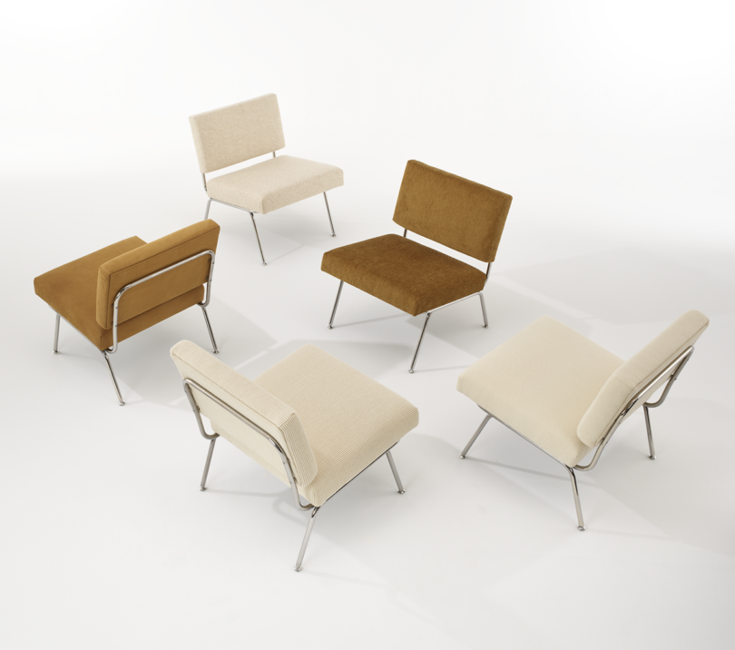five cream and brown colored lounge chairs on a white background