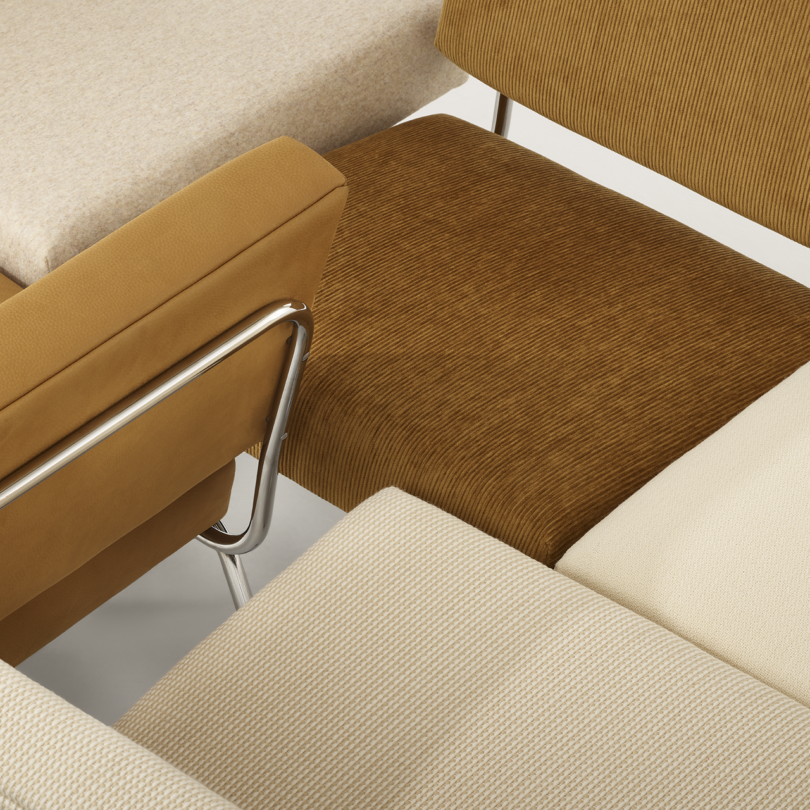 detail of brown and cream lounge chairs