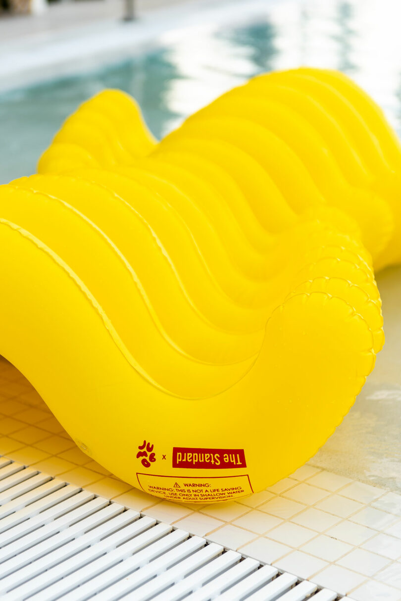 closeup of yellow wavy pool float