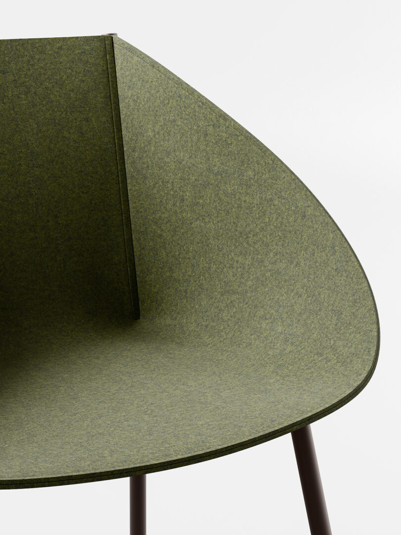 detail of modern green armchair on white background