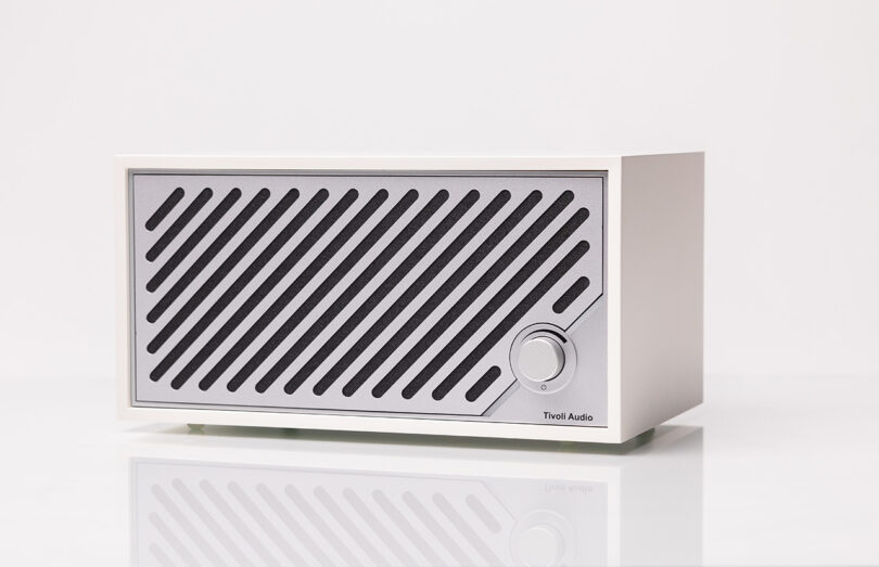 White and silver Tivoli Audio Modern Two Digital wireless speaker staged against a white backdrop.