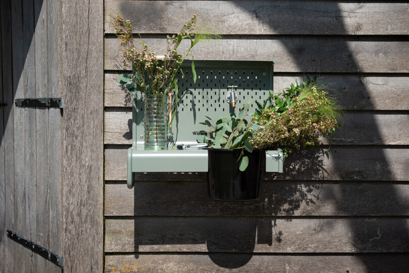 outdoor wall mounted shelf sink with plants