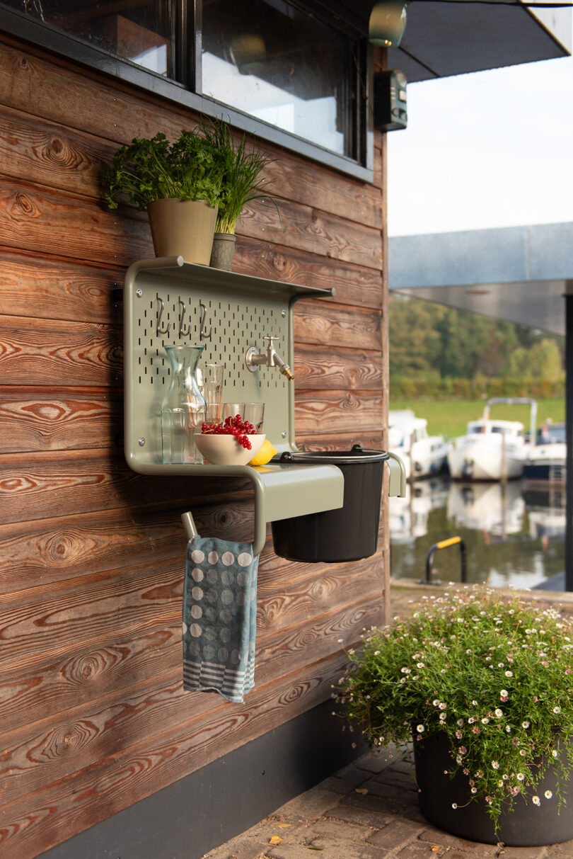 outdoor wall mounted shelf sink with gardening essentials