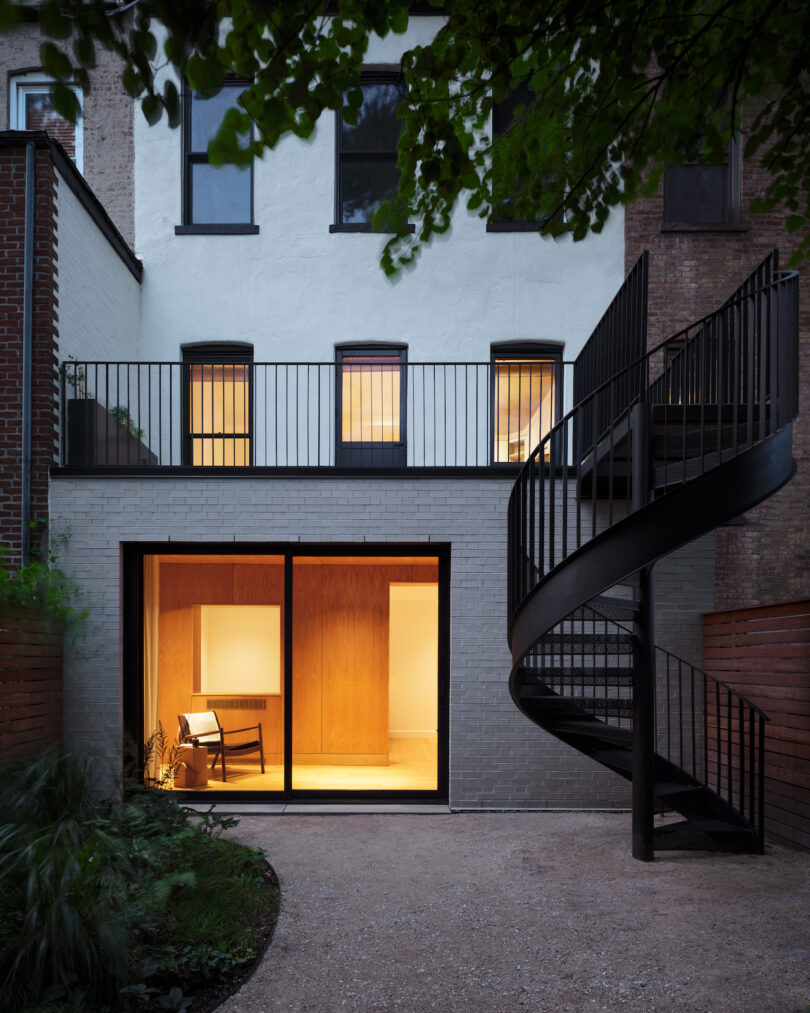 Exterior view of a renovated Brooklyn townhouse in Bedford-Stuyvesant, showcasing a blend of historic and modern design