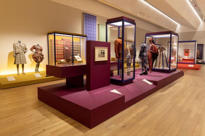 mannequins wearing tartan in museum exhibition