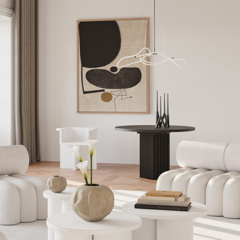 white pendant light in monochromatic living room