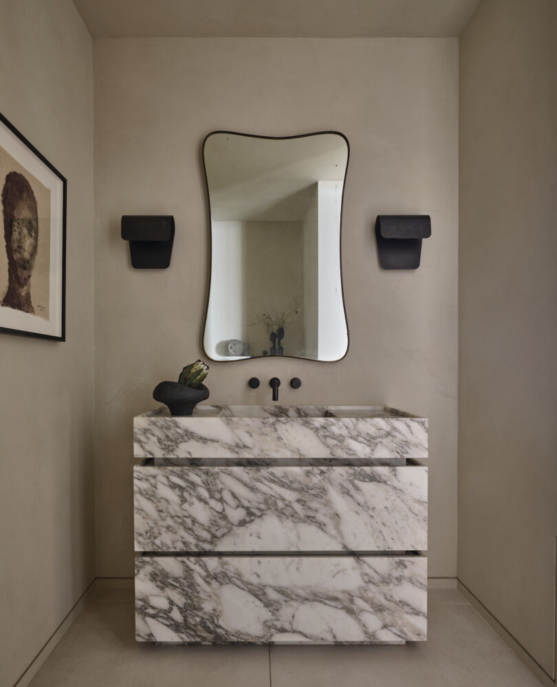 Primary bathroom showcasing an exquisite Il Granito stone vanity
