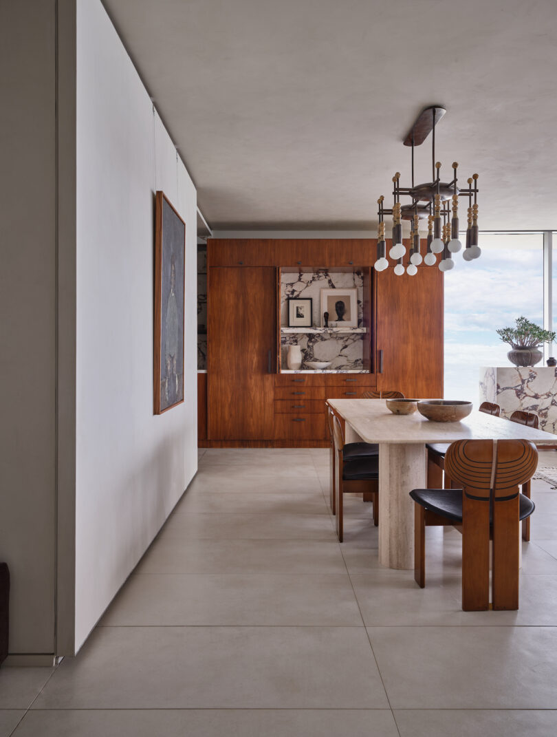 Dining area featuring a custom travertine dining table