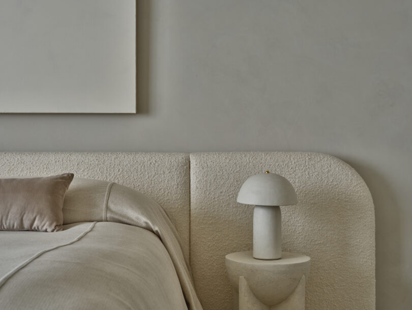 Zen primary bedroom offering a serene retreat, adorned with tranquil artworks by Manolo Ballesteros and Eline Baas.