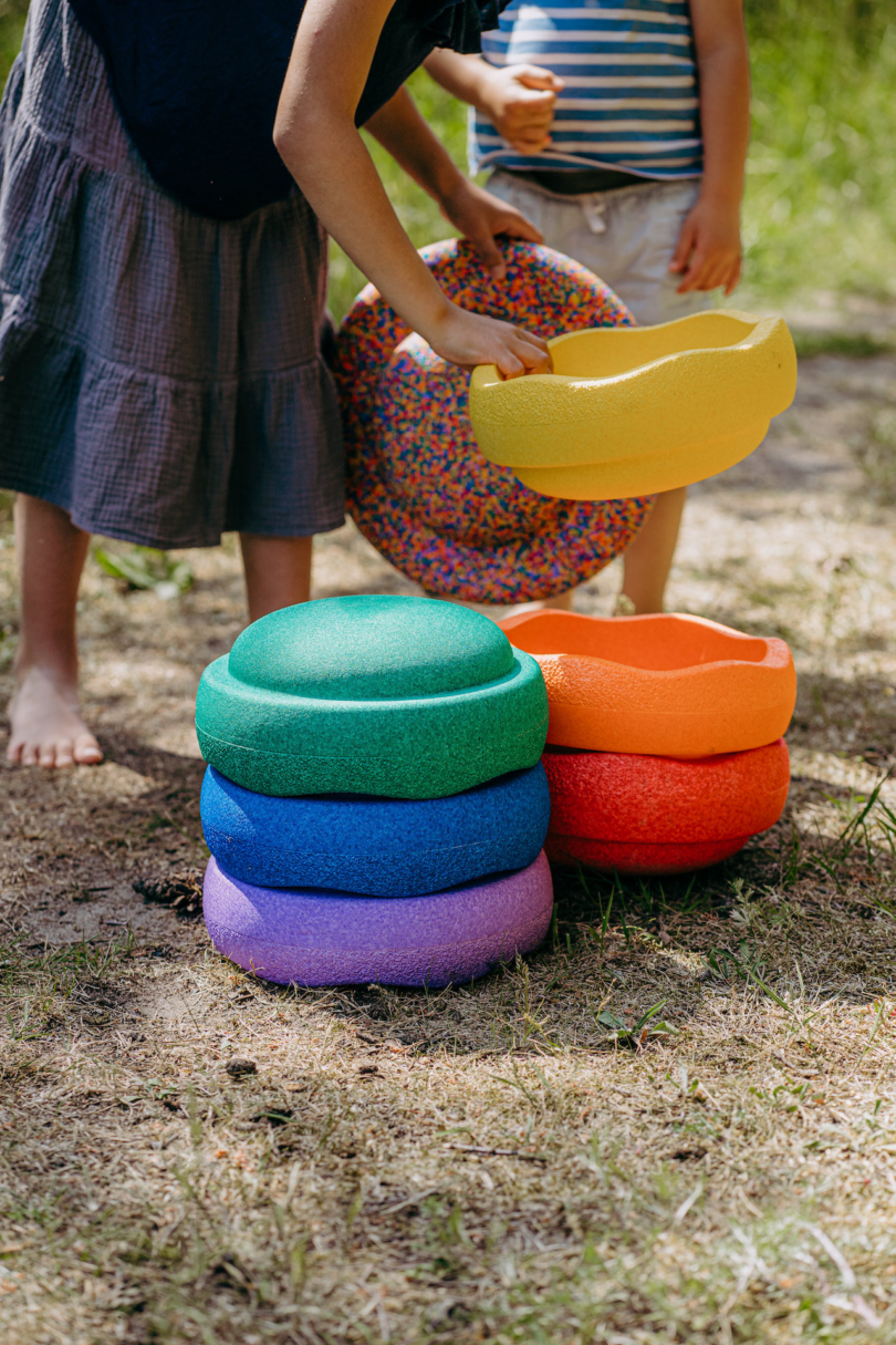 children stacking colorful stepping stone toys