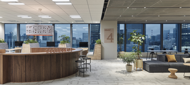 office reception space with floor to ceiling windows