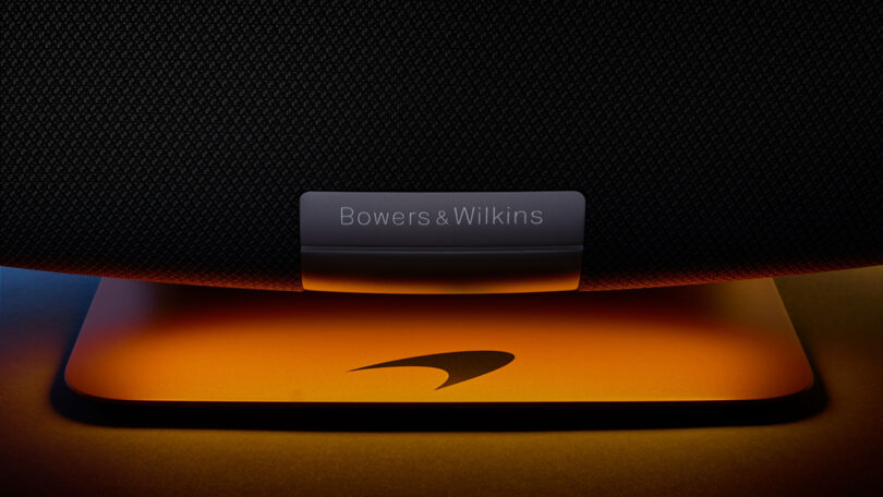 Close up of Bowers & Wilkins logo nameplate on the bottom front of Bowers & Wilkins Zeppelin McLaren Edition wireless speaker.