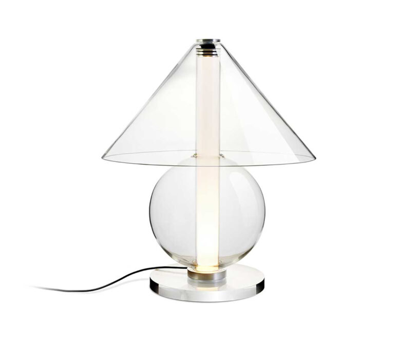 all glass lamp with round base and cone-shaped shade on a white background