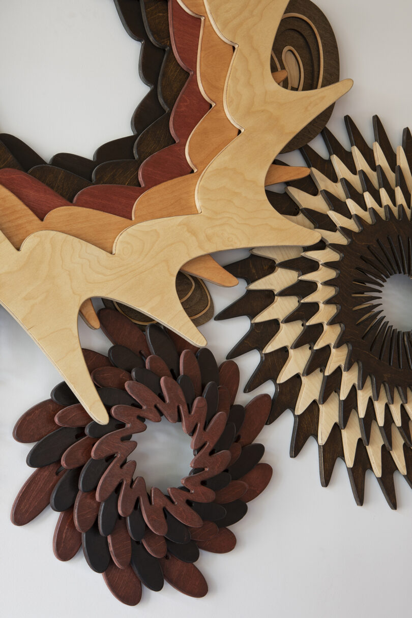 detail of abstract layered wooden wall sculpture