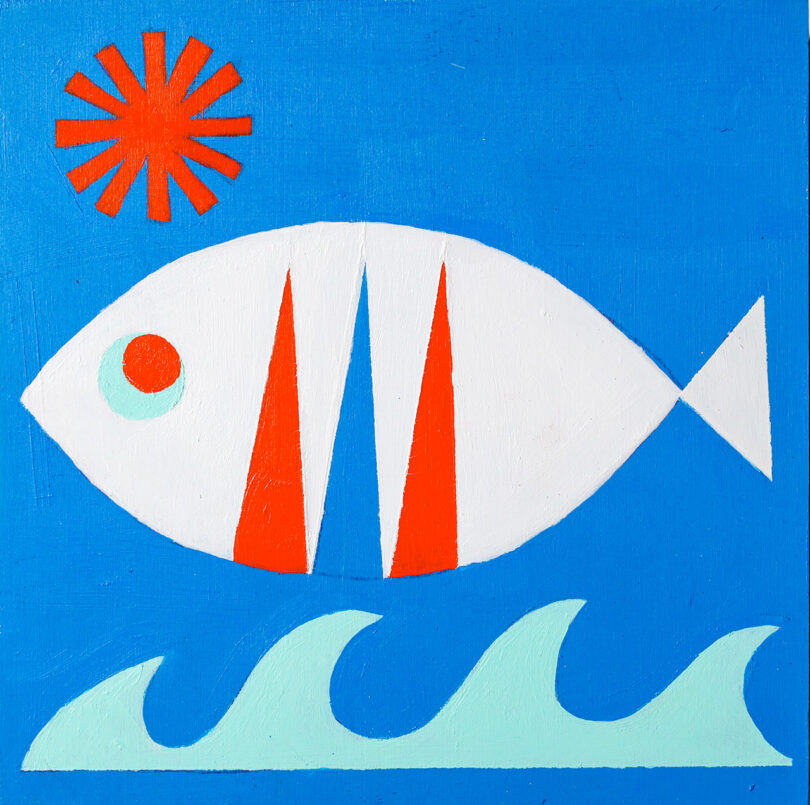 white, blue, and red fish swims through a blue background