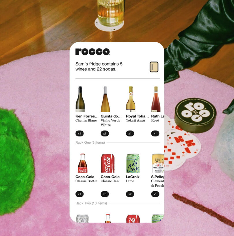 Rocco Super Smart Fridge app screen illustrating the system's ability to monitor contents of the refrigerator. App window displays photo-based contents and lists how many of each drink bottle or can is inside the refrigerator, and includes the note, "Sam's fridge contains 5 wines and 22 sodas" as an example.