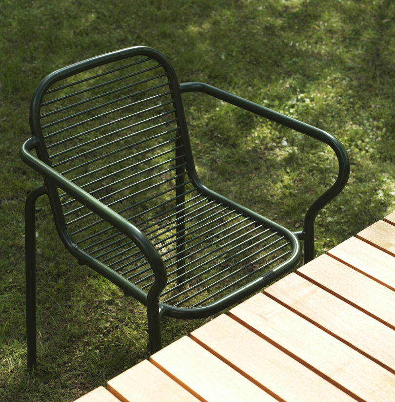 dark green outdoor armchair outside