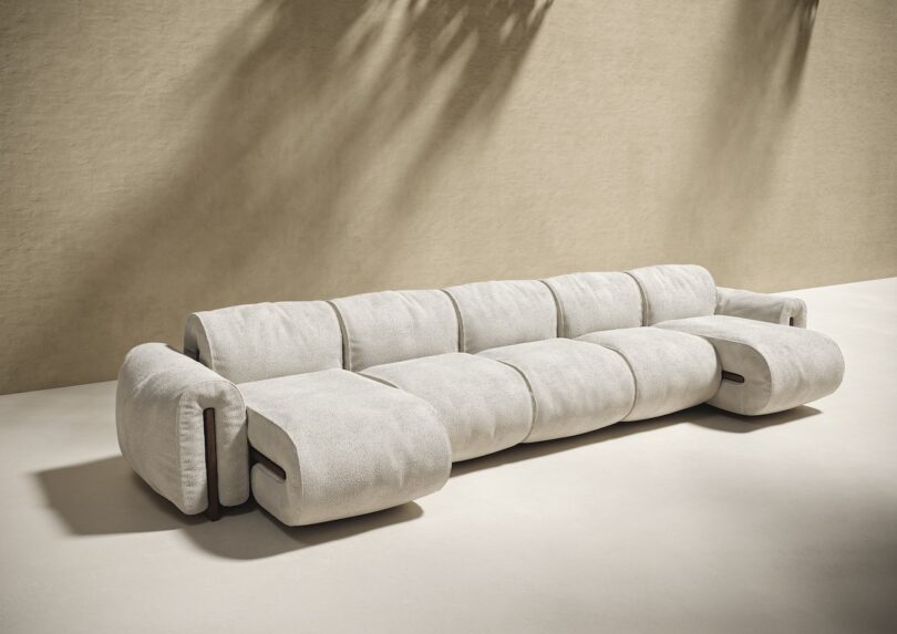 beige five seat sofa
