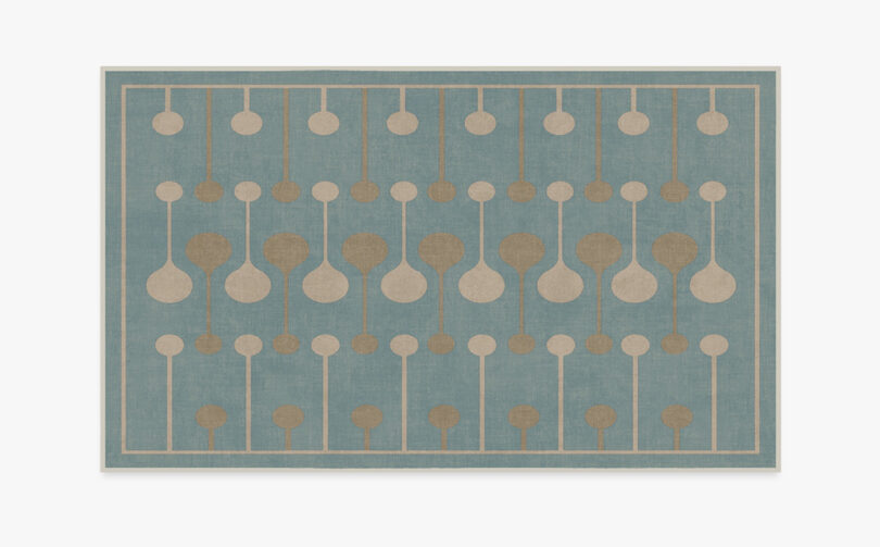Large area rug from Ruggable x Johnathan Adler collection with midcentury inspired pattern.