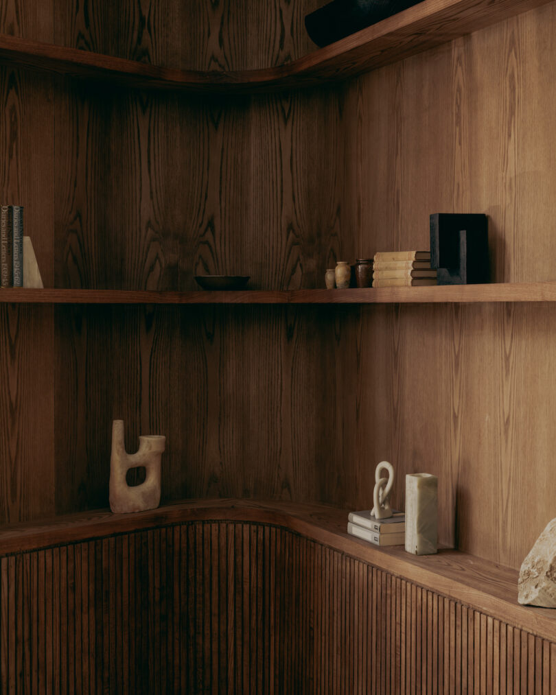 wood shelving with various objects on it