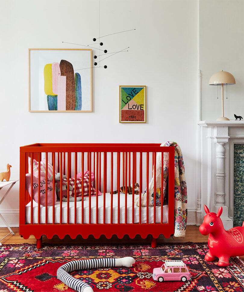 wavy red crib in child's room 
