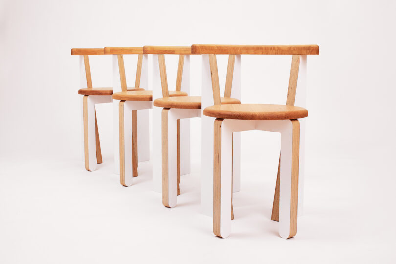 four white dining chairs