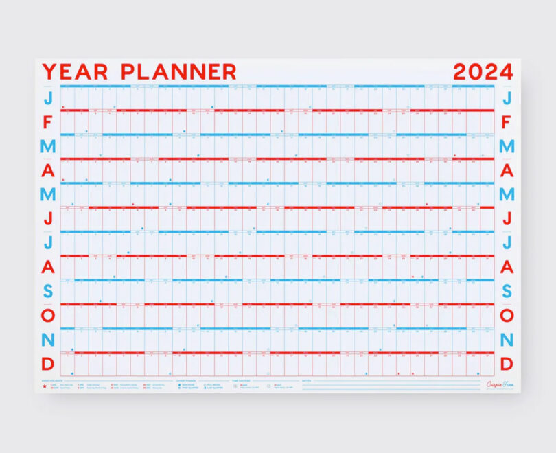 wall planner with red and blue ink on white background