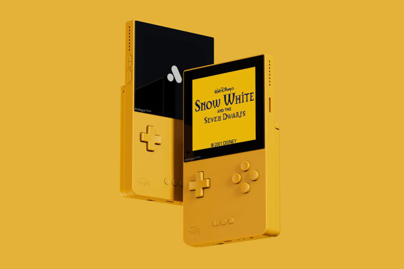 Analogue Classic Limited Edition Pocket in yellow with Snow White and the Seven Dwarves game on its screen