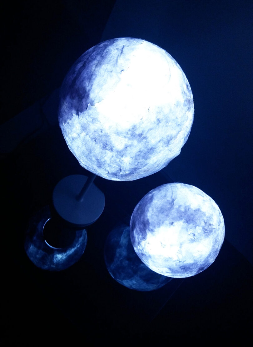 paper orbs that resemble the moon