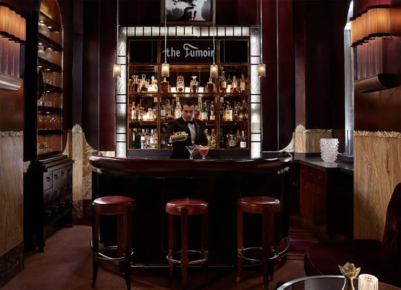 dark, moody interior of a high-class bar