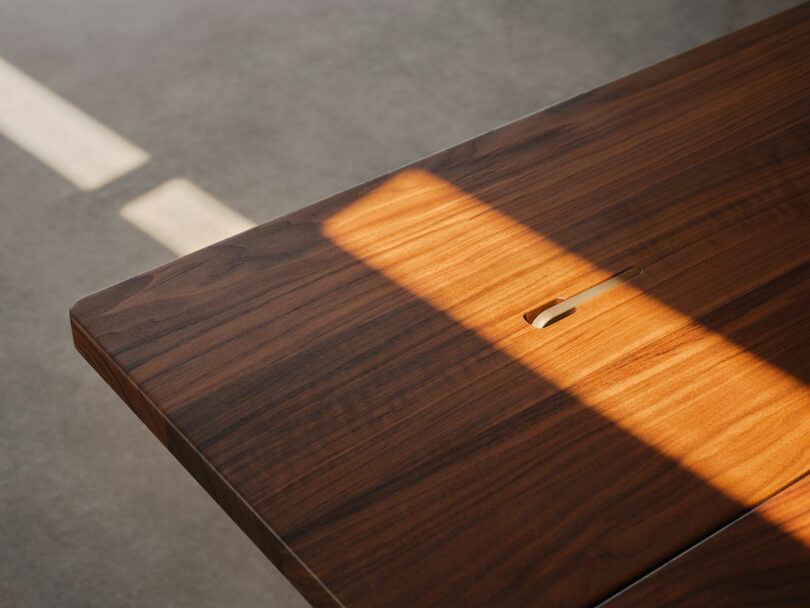 Detail of table hardware in sunlight.