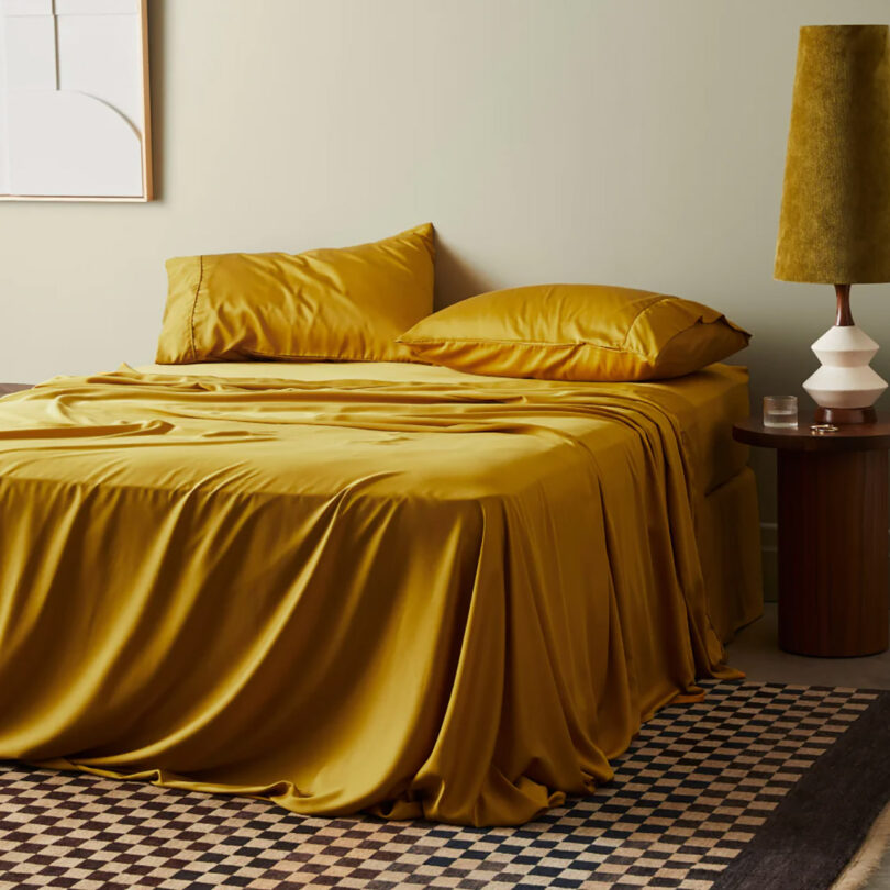 styled bedroom with chartreuse bedding