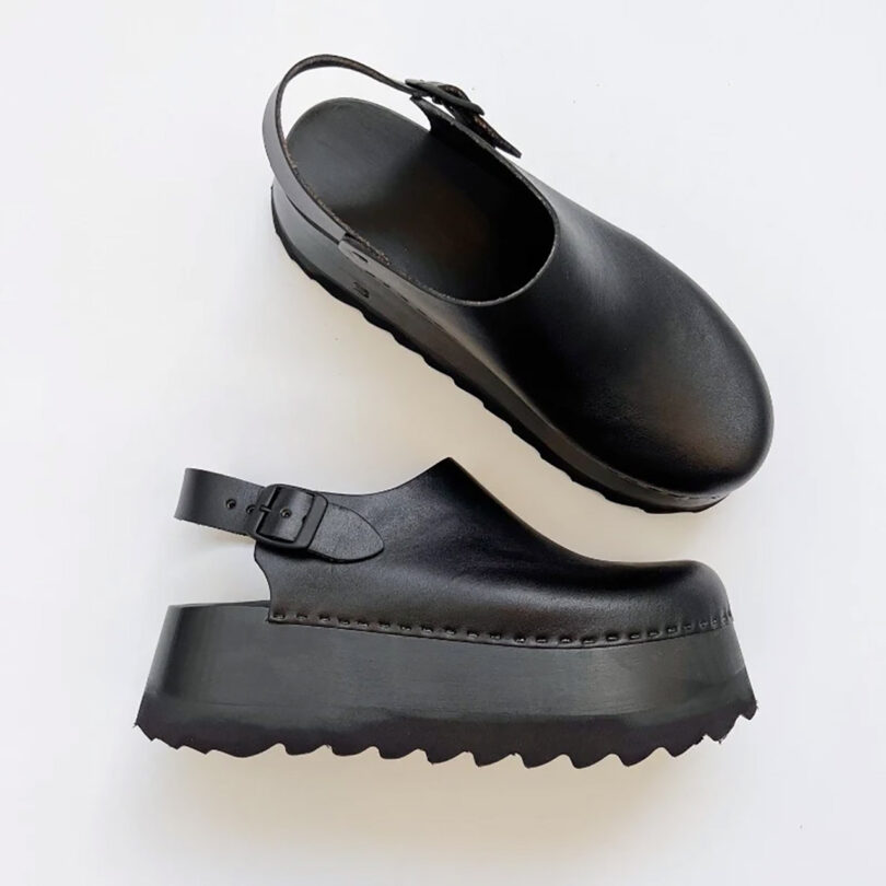 black platform clogs on a white background