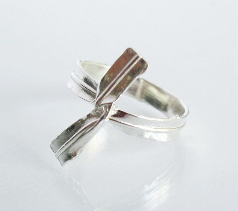 angled view of silver ring that resembles a twist tie