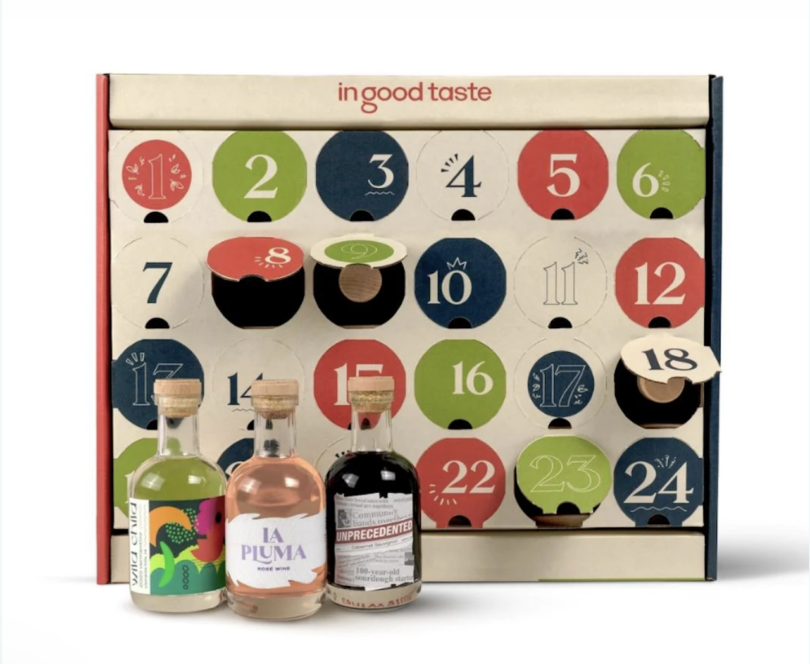 a wine advent calendar with 3 mini wine bottles displayed outside
