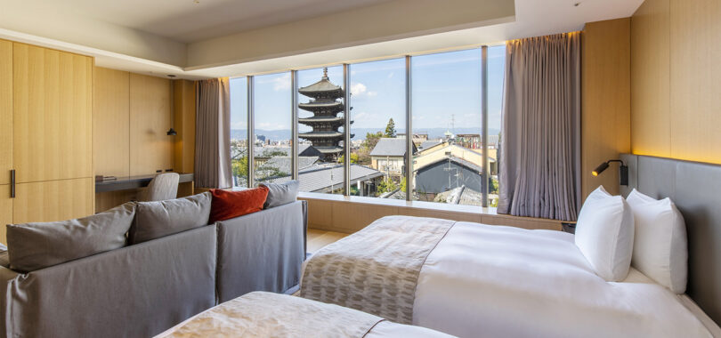 Dual twin bed guest room with view of pagoda outside the The Hotel Seiryu Kyoto Kiyomizu's