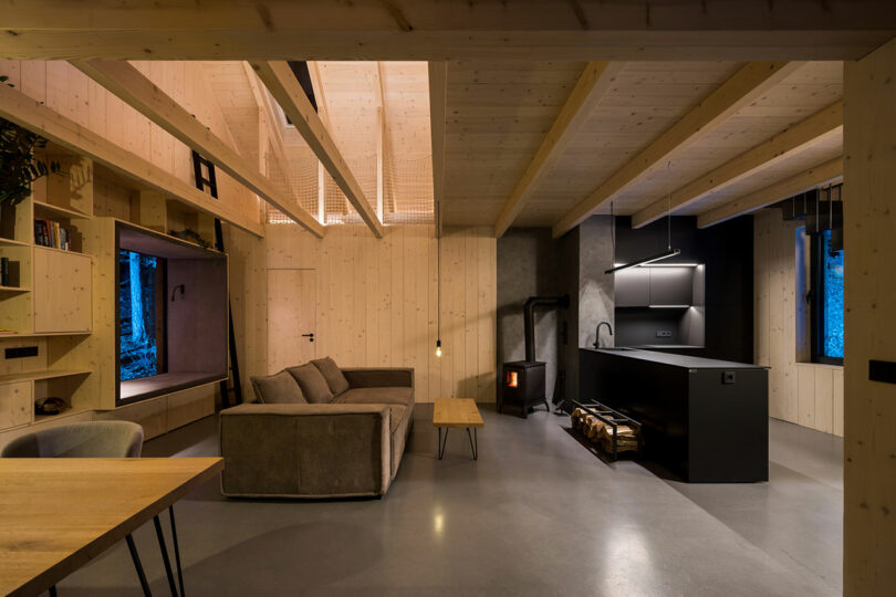 dark and moody interior shot of modern cabin with minimalist furnishings
