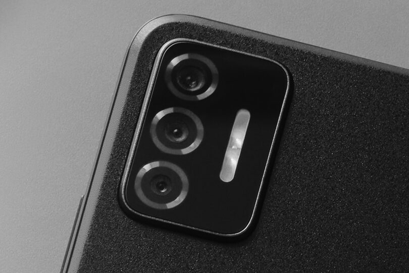 Close up of PUNKT MC02's 64 MP back facing camera with three lenses and flash.