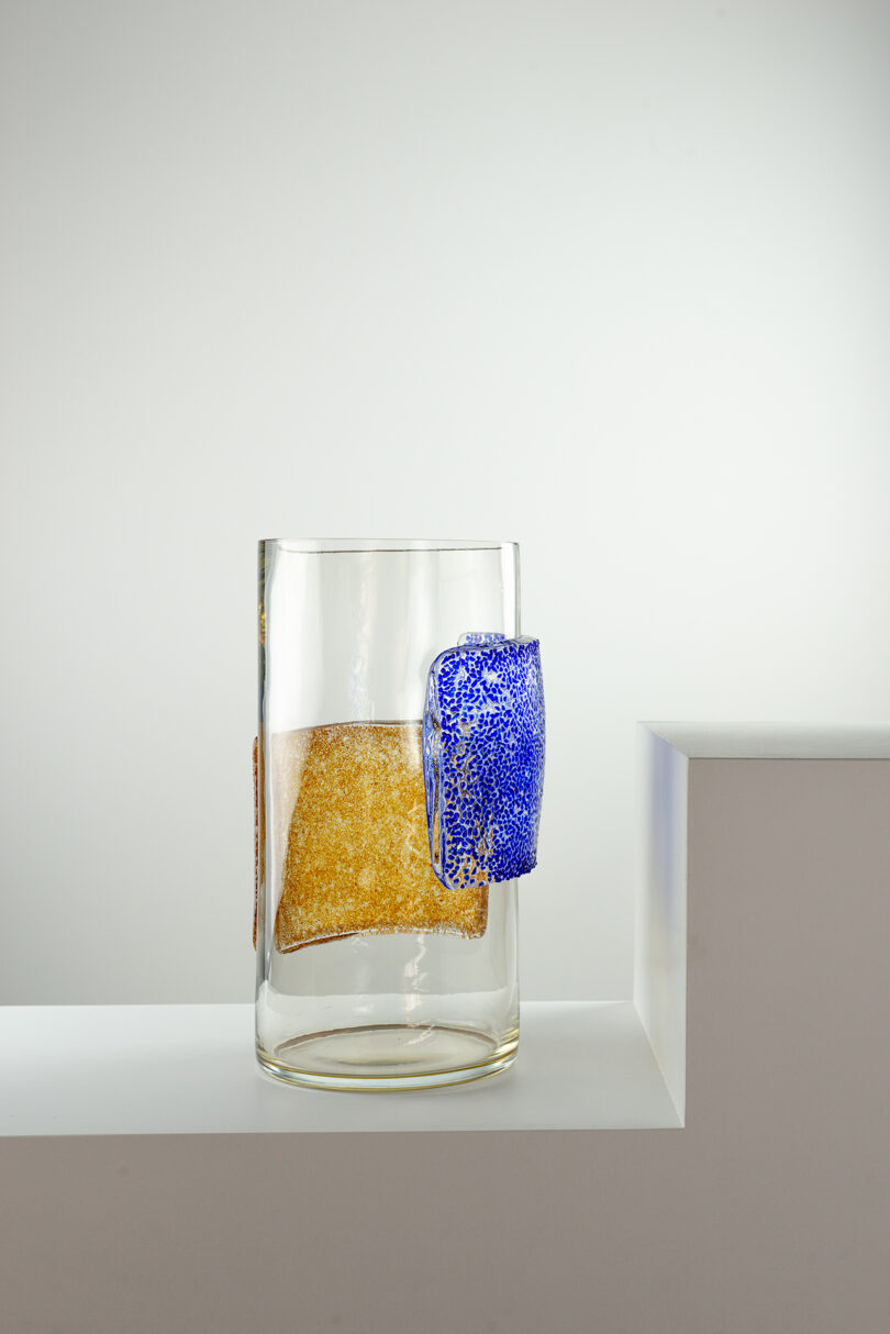 clear, blue, and light brown Murano glass vase