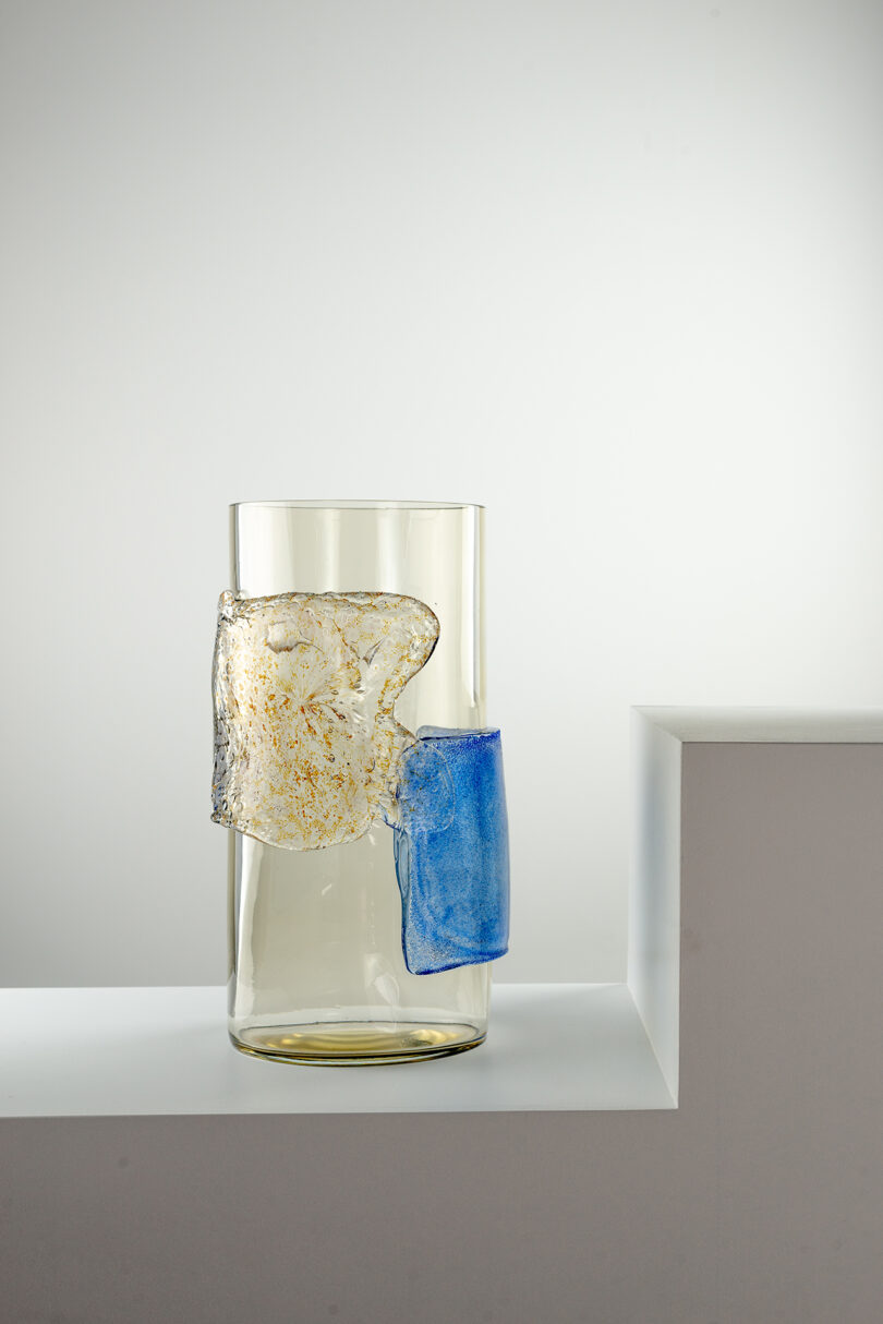 clear, blue, and light brown Murano glass vase