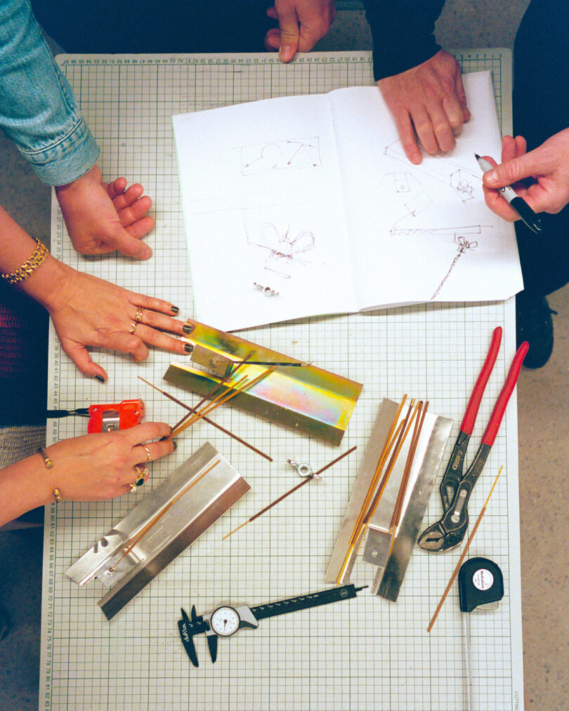 overhead image of a work table strewn with tools