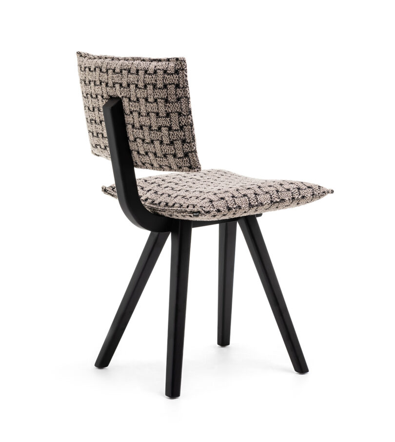 dining chair with black and white patterned padded, upholstered seat and back