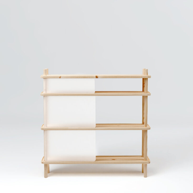 wooden shelving system with transparent panels